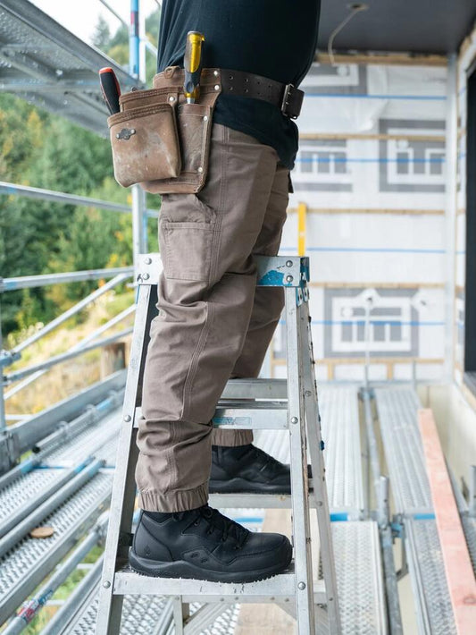 Image of a model wearing Pants. Productname: Volcom - Mens Caliper Cuffed Carpenter Pants - Brindle - in Brindle colour by brand - Volcom