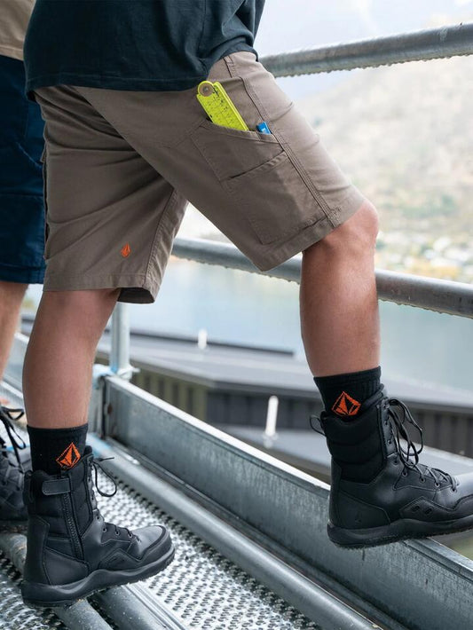 Image of a model wearing Shorts. Productname: Volcom Mens Caliper 20" Carpenter Shorts Brindle - in Brindle colour by brand - Volcom