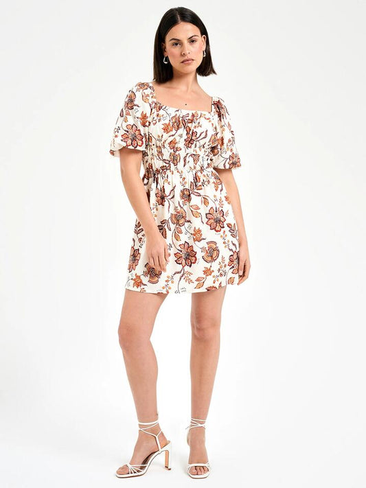Image of a model wearing Dress. Productname: Lulu & Rose Wylder Puff Sleeve Mini Dress in Bloom colour by brand - Lulu & Rose