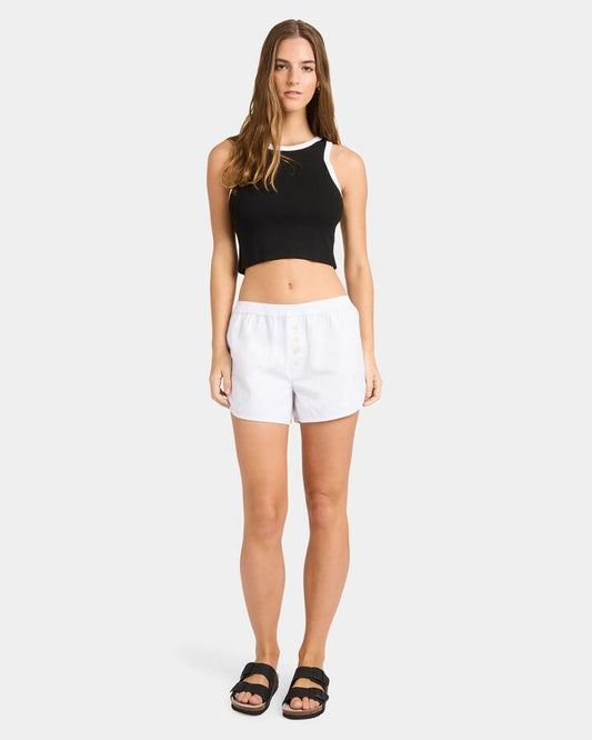 Image of a model wearing Shorts. Productname: Nunui - Womens Cameo Elastic Waist Shorts - White - in White colour by brand - Nunui
