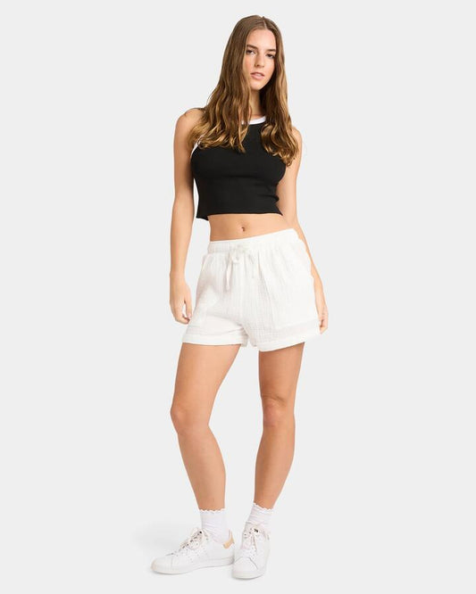 Image of a model wearing Shorts. Productname: Nunui - Womens Timeless Shorts - Summer White - in Summer White colour by brand - Nunui
