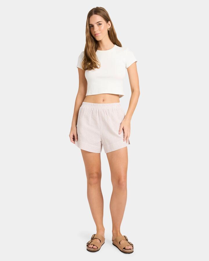 Image of a model wearing Shorts. Product name - Nunui Womens Eilderness Stripe Elastic Waist Shorts Mocha in Mocha colour by brand - Nunui