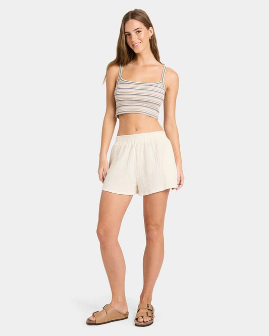 Image of a model wearing Shorts. Product name - Nunui Womens Palmy Elastic Waist Shorts Natural in Natural colour by brand - Nunui