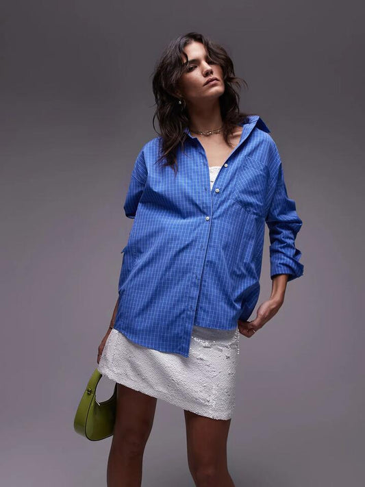 Image of a model wearing Tops. Productname: Topshop Micro Check Oversize Shirt in Rich Blue colour by brand - Topshop