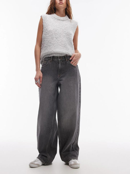 Image of a model wearing Denim. Productname: Topshop Low Rise Cinch Jeans in Dark Vintage Grey colour by brand - Topshop