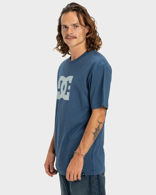 Image of a model wearing Tops. Productname: DC Shoes Mens Dc Star T-Shirt Dark Denim - in Dark Denim colour by brand - DC Shoes