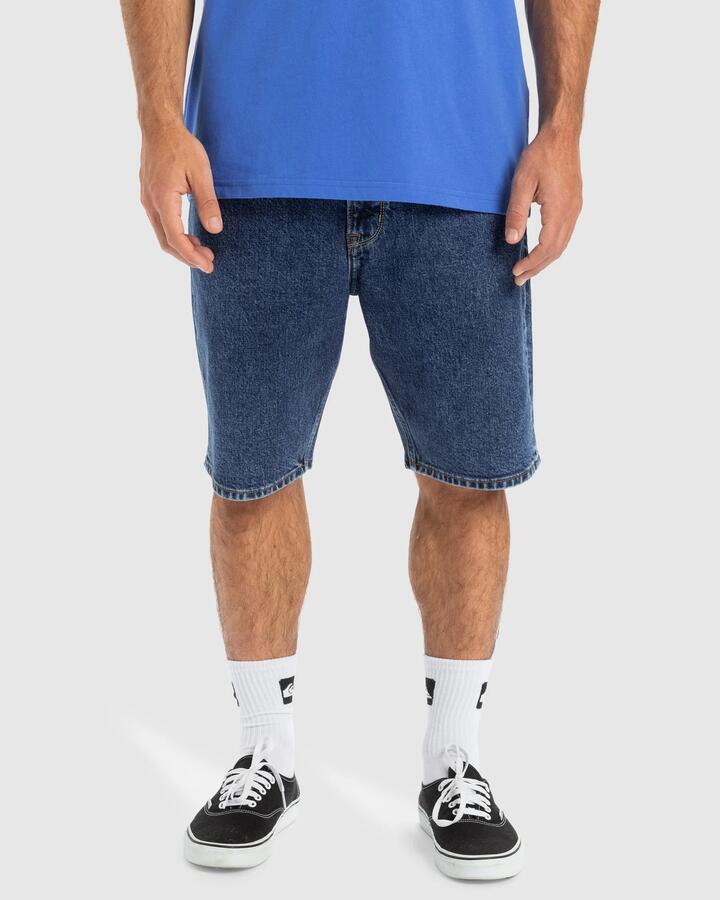 Image of a model wearing Shorts. Product name - Quiksilver Mens Aqua Cult 20" Denim Shorts Aged in Aged colour by brand - Quiksilver