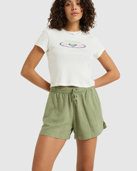 Image of a model wearing Shorts. Productname: Roxy - Womens Lekeitio Break Elastic Waist Shorts - Oil Green - in Oil Green colour by brand - Roxy