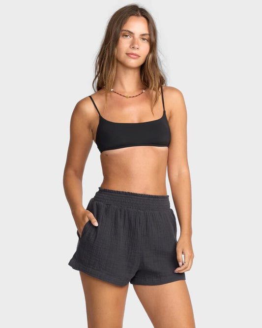 Image of a model wearing Shorts. Productname: Billabong - Womens In The Waves Elastic Waist Shorts - Black Sands - in Black Sands colour by brand - Billabong