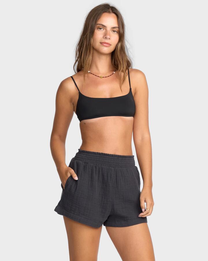 Image of a model wearing Shorts. Product name - Billabong Womens In The Waves Elastic Waist Shorts Black Sands in Black Sands colour by brand - Billabong
