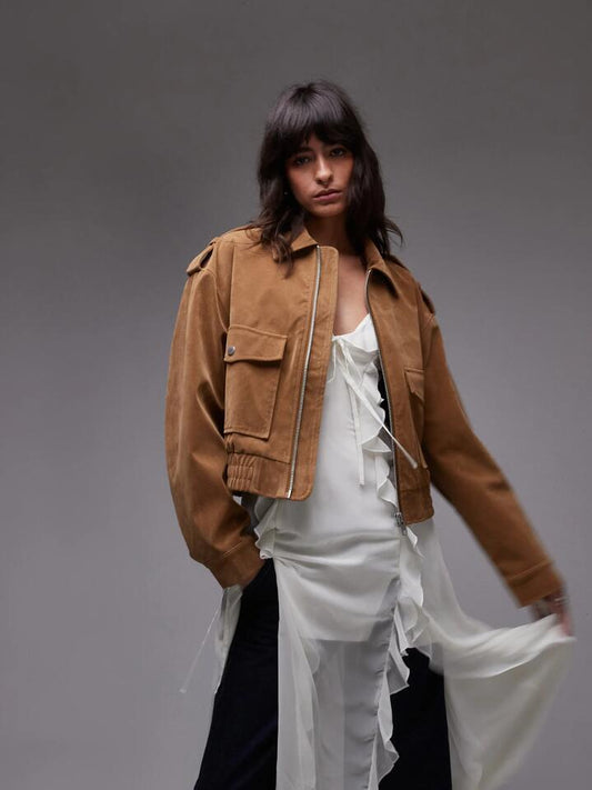 Image of a model wearing Outerwear. Productname: Topshop Cropped Suede Bomber Jacket in Camel colour by brand - Topshop