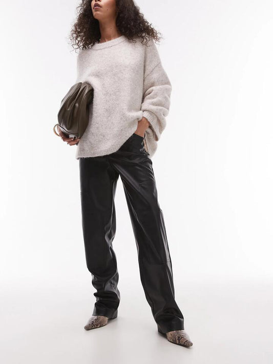 Image of a model wearing Pants. Productname: Topshop Western Patch Leather Trouser in Black colour by brand - Topshop