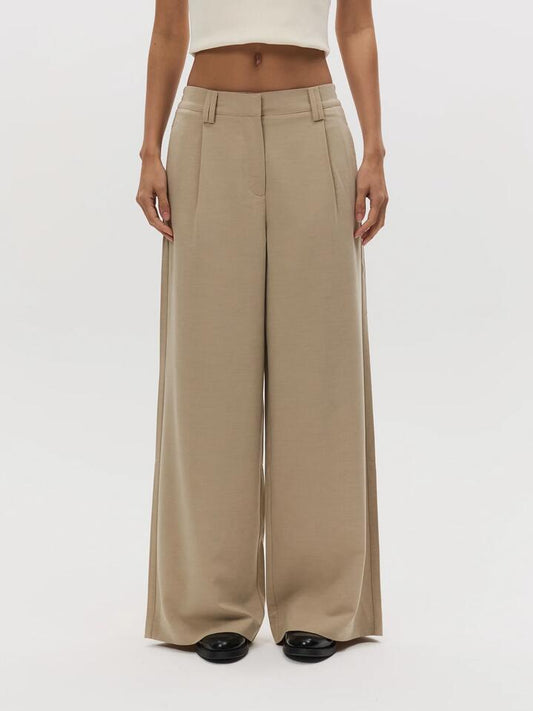 Image of a model wearing Pants. Productname: Lulu & Rose Iggy Pant in Fawn colour by brand - Lulu & Rose