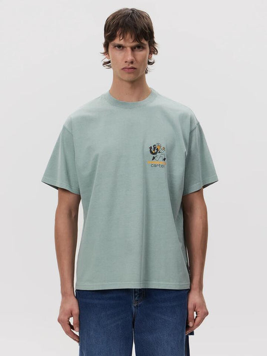Image of a model wearing Tops. Productname: Weekend Cartel Pelican! Tee in GREEN TINT colour by brand - Weekend Cartel