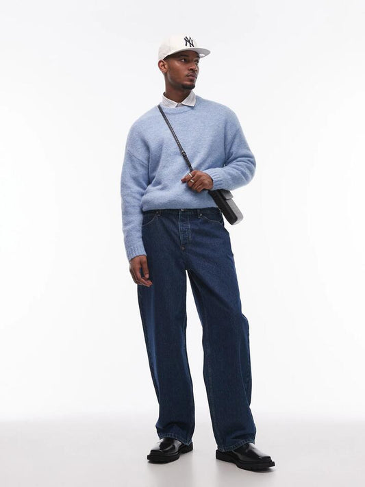 Image of a model wearing Denim. Productname: Topman Topman Baggy Jeans in Mid Blue colour by brand - Topman