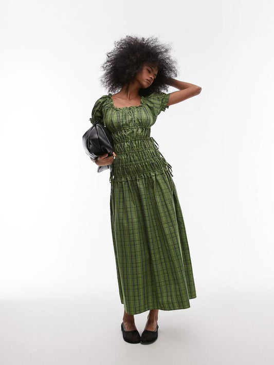 Image of a model wearing Dress. Productname: Topshop Cap Sleeve Ruched Dress in Green Check colour by brand - Topshop