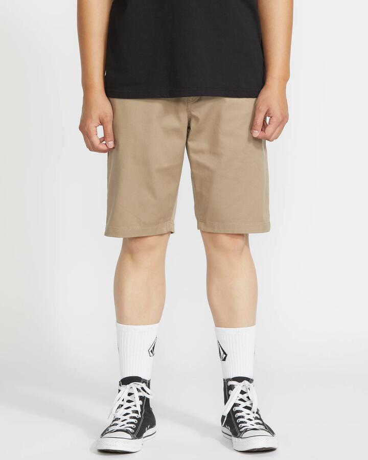 Image of a model wearing Shorts. Productname: Volcom - Mens Frickin Modern Stretch 21" Walk Shorts - Khaki - in Khaki colour by brand - Volcom