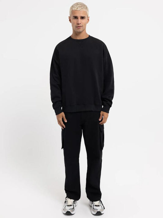 Image of a model wearing Outerwear. Productname: Article One Finley Crew Sweater in Black colour by brand - Article One
