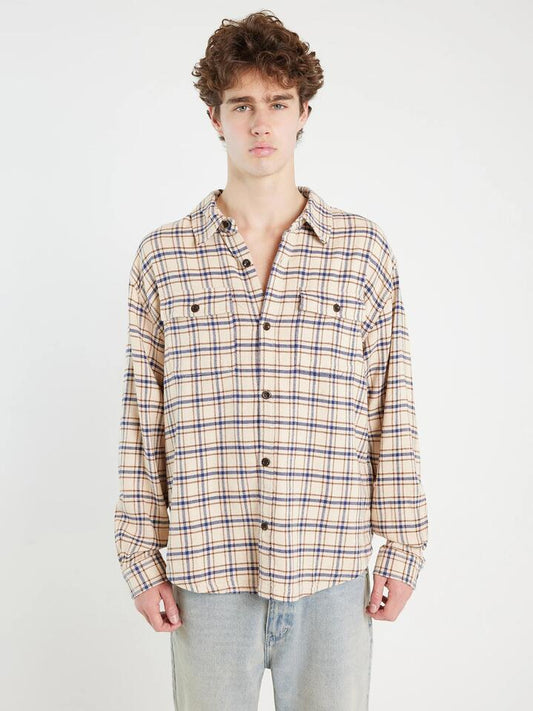 Image of a model wearing Outerwear. Productname: Article One Ruben Plaid Overshirt in Beige colour by brand - Article One
