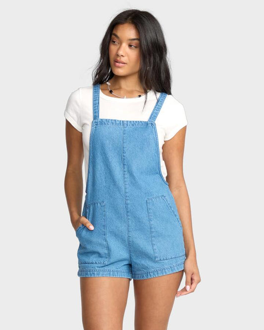 Image of a model wearing Pants. Productname: Billabong - Womens Beach Crush Denim Overalls - Salt Washed - in Salt Washed colour by brand - Billabong