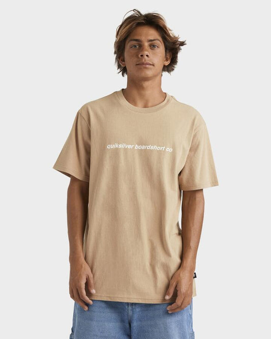 Image of a model wearing Pants. Productname: Quiksilver Mens Overall T-Shirt Cornstalk - in Cornstalk colour by brand - Quiksilver