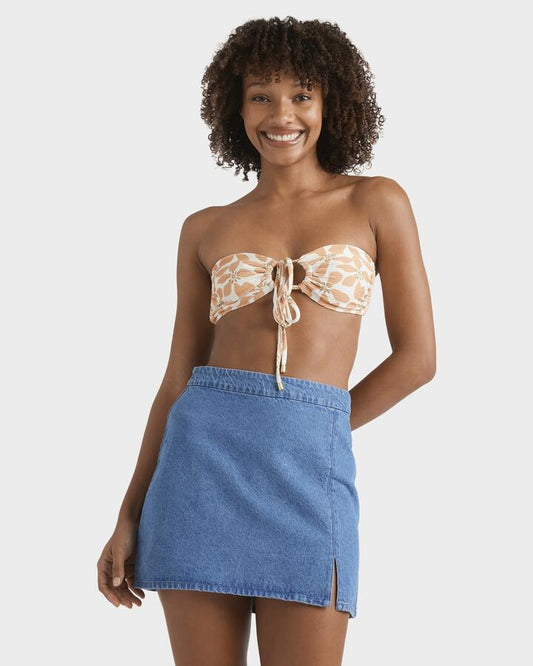 Image of a model wearing Skirts. Product name - Billabong Womens Wave Washed Denim Skirt Salt Washed in Salt Washed colour by brand - Billabong