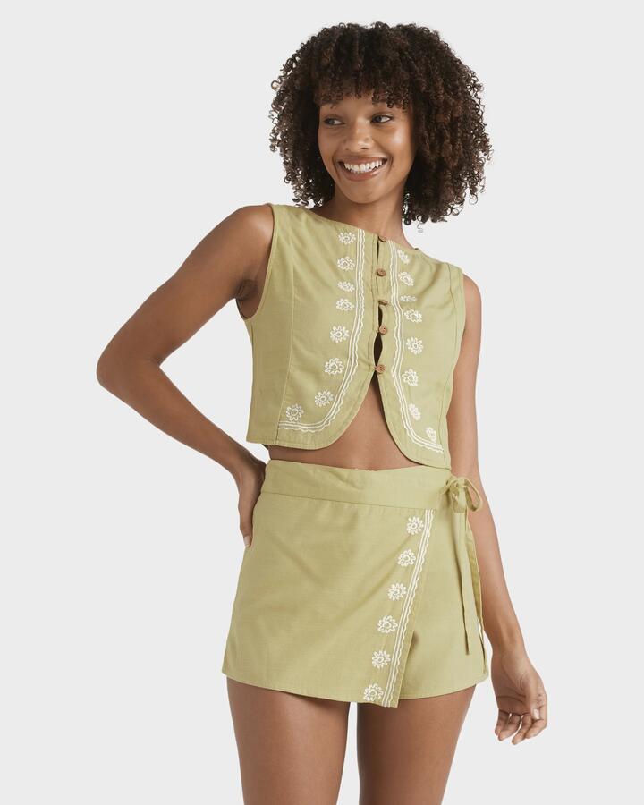 Image of a model wearing Skirts. Productname: Billabong - Womens Your Crush Skort - Light Olive - in Light Olive colour by brand - Billabong