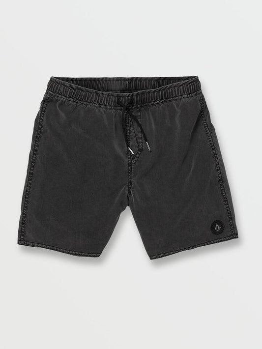 Image of a model wearing Shorts. Productname: Volcom Boys 8-16 Center Swim Shorts Black - in Black colour by brand - Volcom