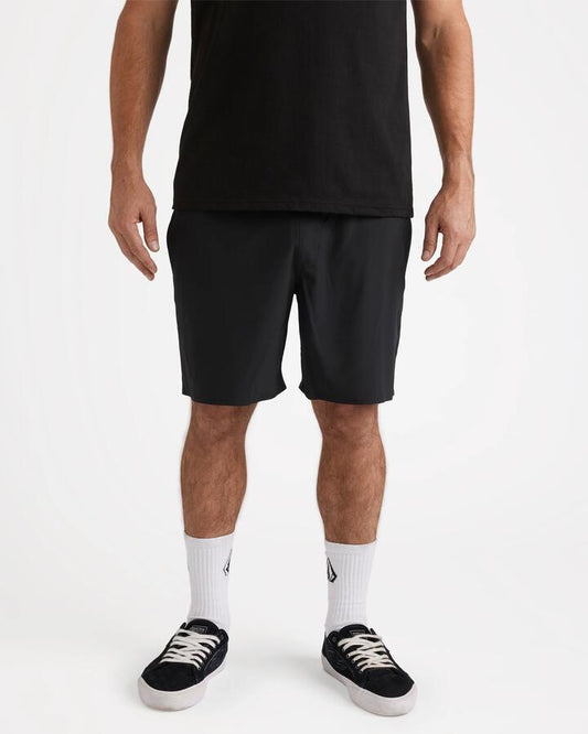 Image of a model wearing Shorts. Productname: Volcom - Mens Sparklestone Walk Shorts - Antique Black - in Antique Black colour by brand - Volcom
