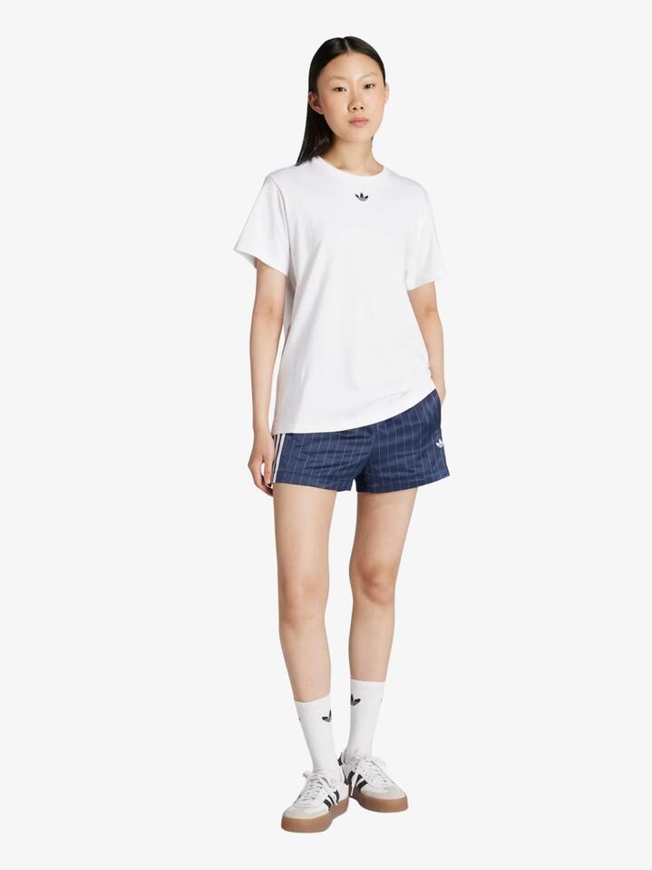 Image of a model wearing Shorts. Productname: Adidas Soccer Summer Satin Pinstripe Classic Shorts in night indigo colour by brand - Adidas