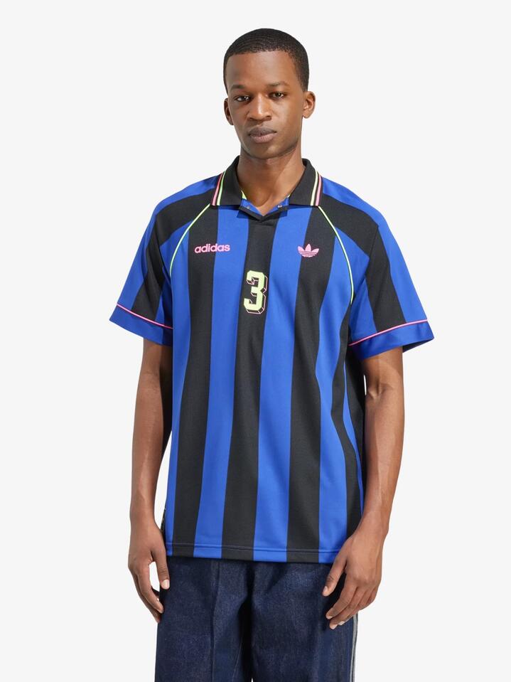 Image of a model wearing Tops. Productname: Adidas Jacquard Jersey in SEMI LUCID BLUE/BLACK colour by brand - Adidas