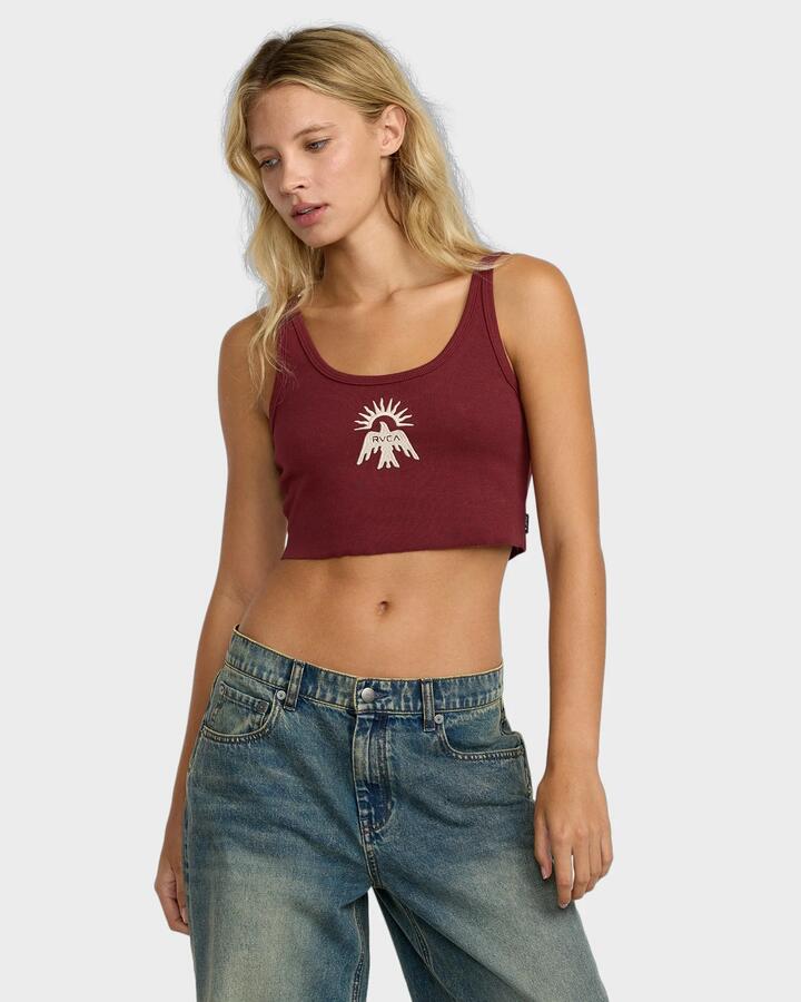 Image of a model wearing Tops. Product name - RVCA Womens Scoop Tank Top Cranberry in Cranberry colour by brand - RVCA