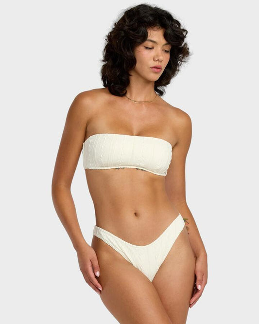 Image of a model wearing Tops. Productname: RVCA Womens Sweetness Bandeau Bikini Top Vanilla Latte - in Vanilla Latte colour by brand - RVCA