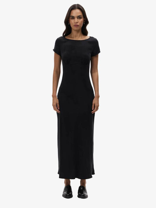 Image of a model wearing Dress. Productname: Lulu & Rose Chere Cupro Maxi Dress in Black colour by brand - Lulu & Rose