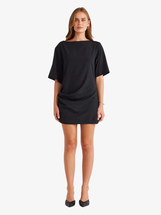 Image of a model wearing Dress. Productname: SNDYS Aire Mini Dress in BLACK colour by brand - SNDYS