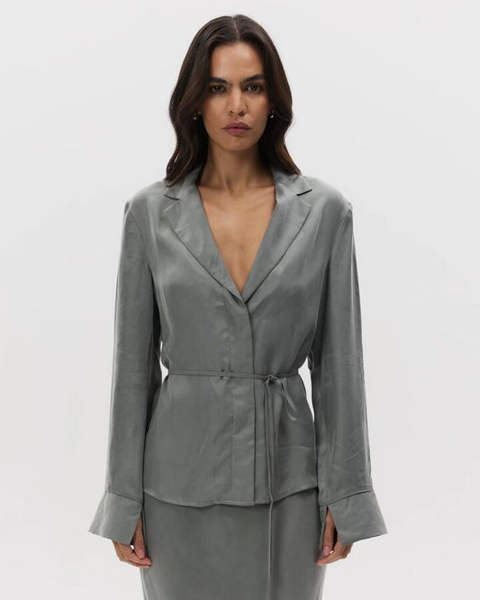 Image of a model wearing Tops. Productname: Lulu & Rose Chere Cupro Wrap Blouse in Silver colour by brand - Lulu & Rose
