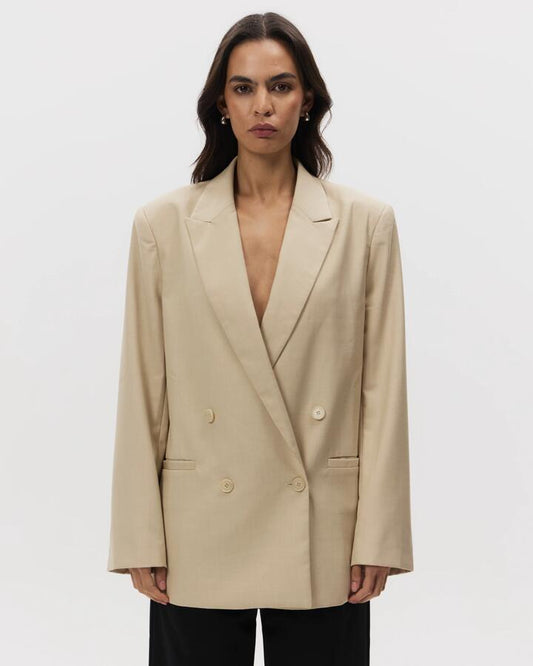 Image of a model wearing Outerwear. Productname: MSE Double Breasted Blazer in Natural colour by brand - MSE