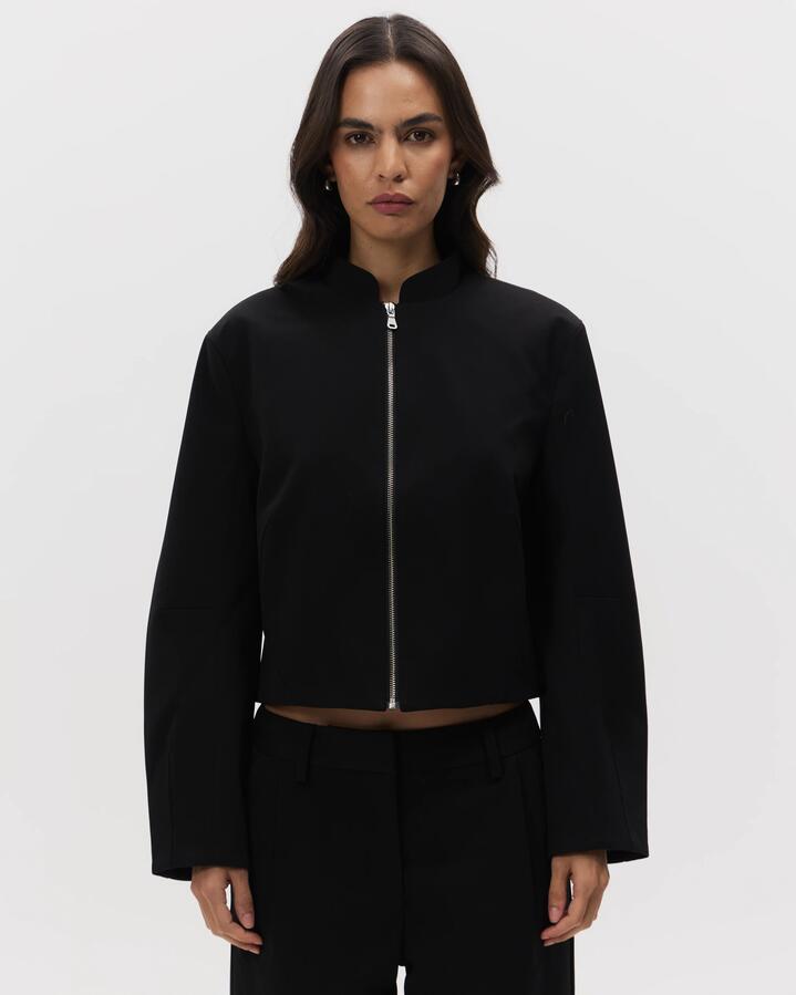 Image of a model wearing Outerwear. Productname: MSE Zip Front Bomber in Black colour by brand - MSE