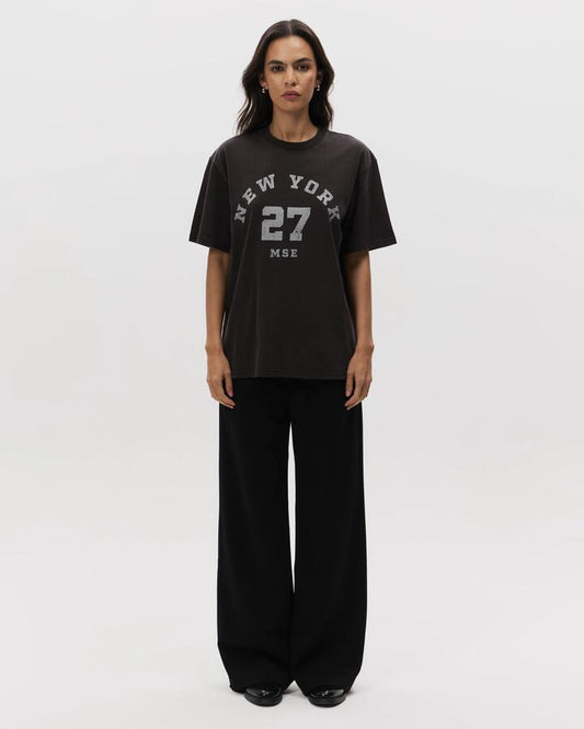 Image of a model wearing Pants. Productname: MSE Relaxed Pant in Black colour by brand - MSE