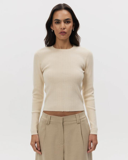 Image of a model wearing Tops. Productname: Lulu & Rose Daria Seam Front Top in Vanilla colour by brand - Lulu & Rose