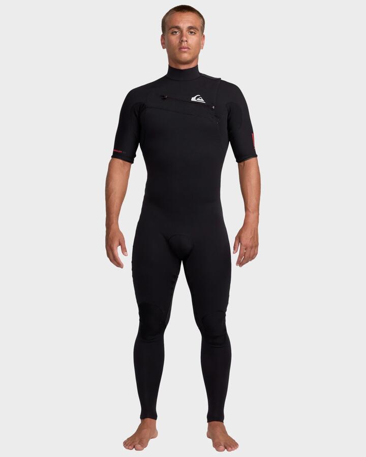 Image of a model wearing Tops. Productname: Quiksilver Mens 2/2Mm Highline Short Sleeve Chest Zip Wetsuit Black - in Black colour by brand - Quiksilver