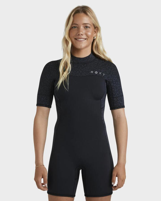 Image of a model wearing Tops. Productname: Roxy - Womens 2Mm Swell Natural Back Zip Springsuit - Animal Print - in Animal Print colour by brand - Roxy