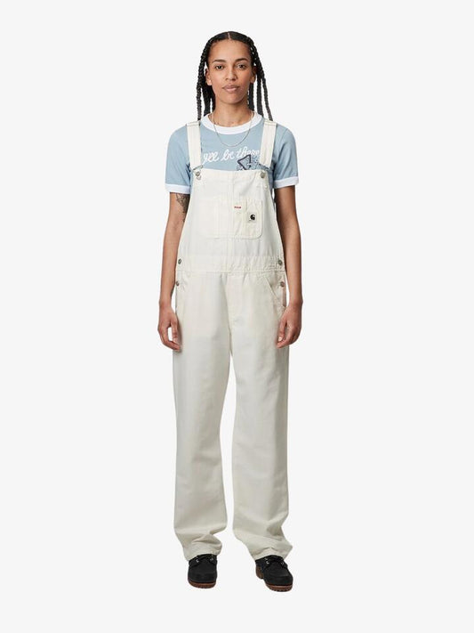 Image of a model wearing Pants. Productname: Carhartt Wip Bib Overall Straight in Wax colour by brand - Carhartt Wip