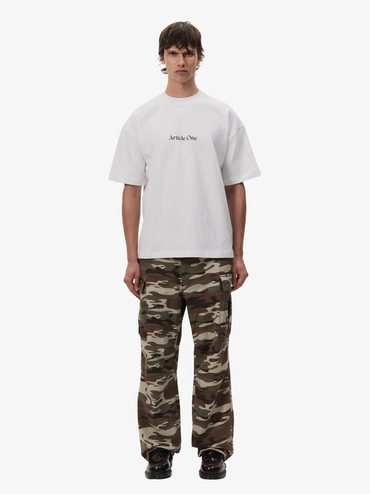 Image of a model wearing Pants. Productname: Article One Flight Cargo in Camo colour by brand - Article One