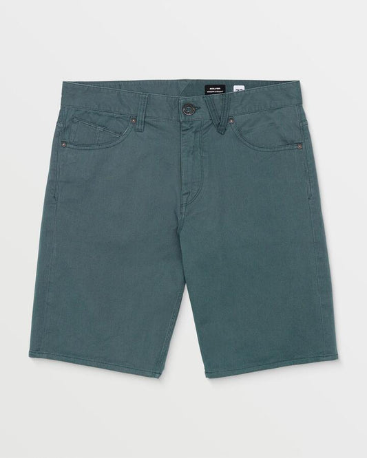 Image of a model wearing Shorts. Productname: Volcom - Mens Solver Lite 5 Pocket 19" Walk Shorts - Dark Slate - in Dark Slate colour by brand - Volcom