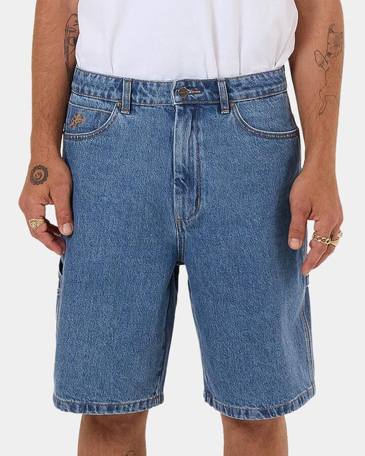 Image of a model wearing Shorts. Productname: Worship - Mens Glazed And Confused Carpenter Denim Shorts - Blue - in Blue colour by brand - Worship