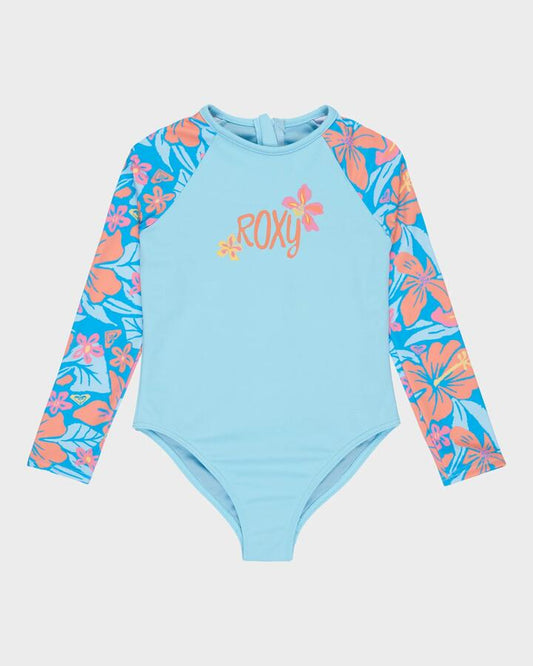 Image of a model wearing Tops. Product name - Roxy Girls 2-7 Hibiscus Hugs Long Sleeve Onesie Rash Vest Malibu Blue Hibiscus Hugs in Malibu Blue Hibiscus Hugs colour by brand - Roxy