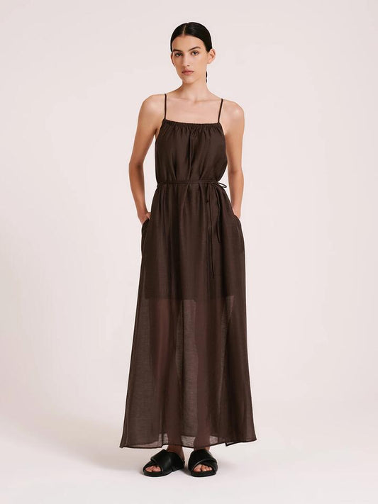 Image of a model wearing Dress. Productname: Nude Lucy Ziki Maxi Dress in Bark colour by brand - Nude Lucy