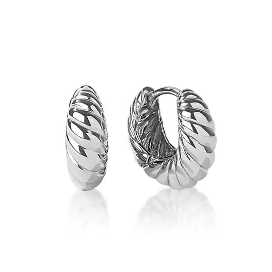 Image of Earrings. Productname: Mini Croissant Huggie Earrings in Sterling Silver in Silver colour by brand - Bevilles