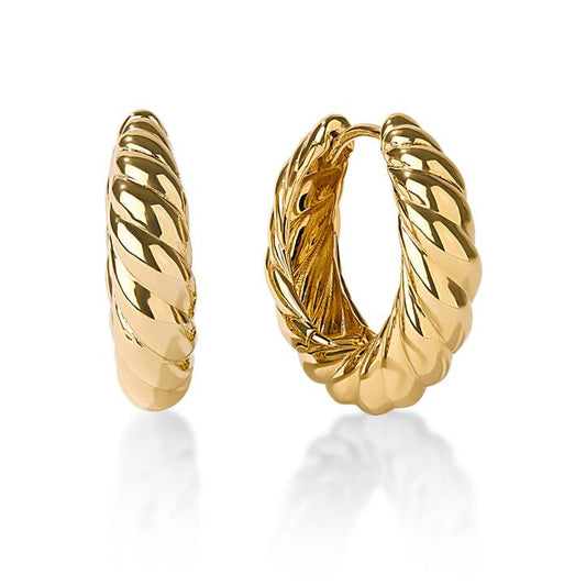 Image of Earrings. Productname: Large Croissant Huggie Earrings in 18kt Gold Plated Sterling Silver in Silver colour by brand - Bevilles
